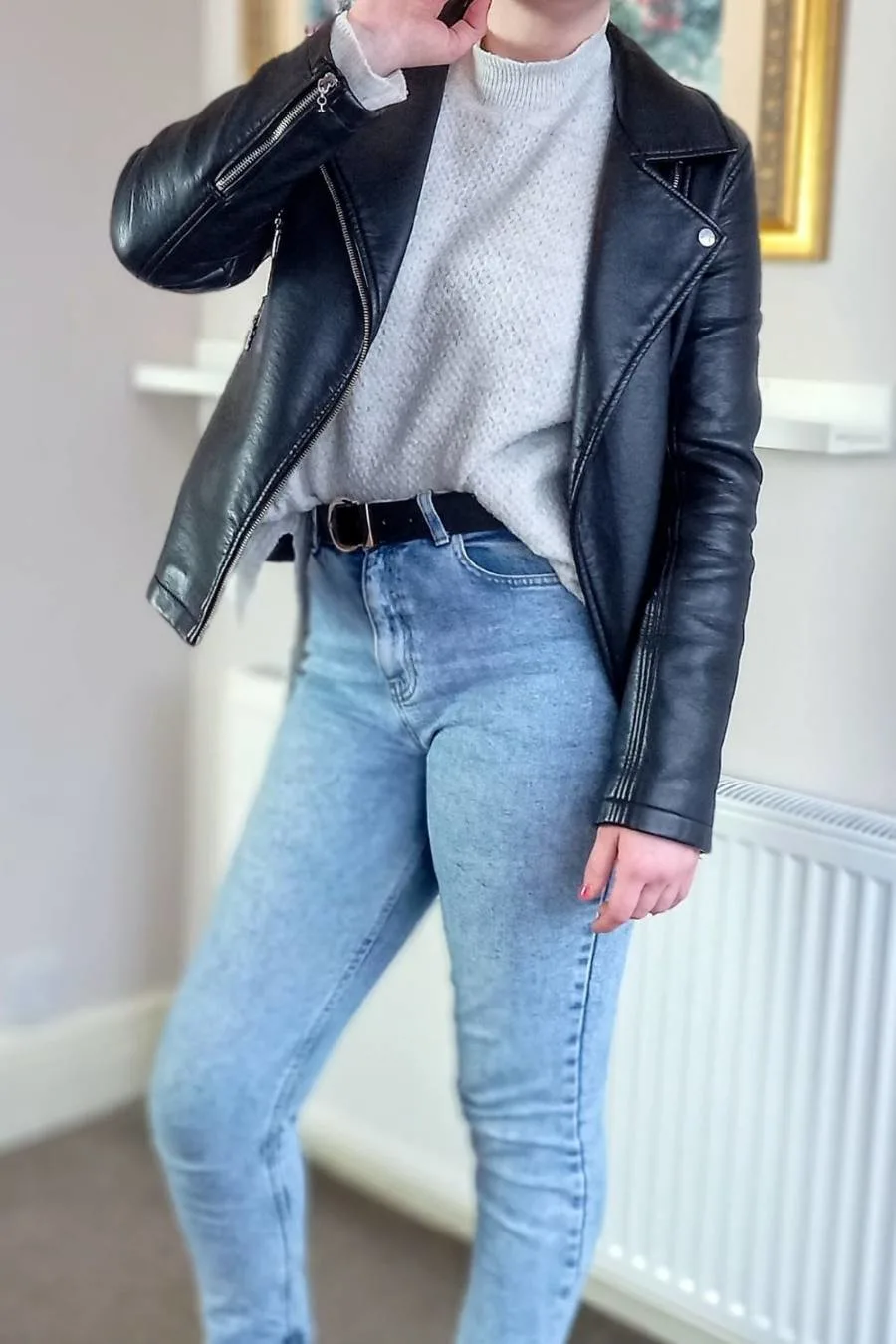light wash mom jeans and a leather jacket