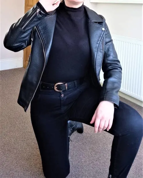 Black turtleneck and leather jacket